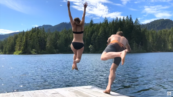 jack and nicole jumping off a dock