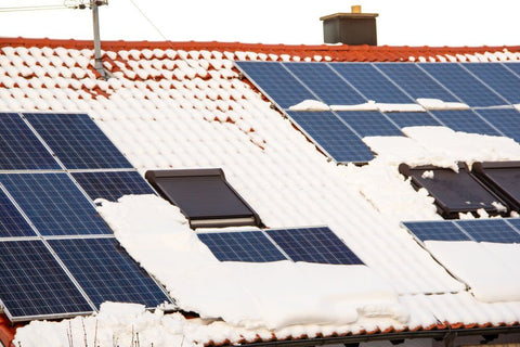 solar panels and snow