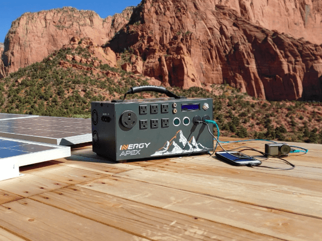 Inergy APEX Portable Solar Power Station plugged in outside- Shop Solar Kits